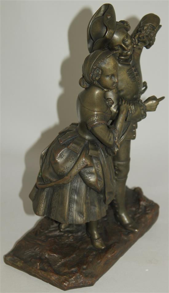 A late 19th century patinated figural bronze modelled as a soldier and his wife, 9.75ins high